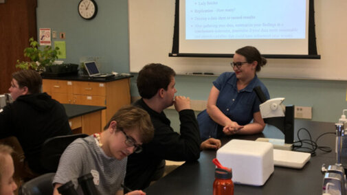 Kait Chapman Discusses with high school student at Visits with a Scientist Program at LPS