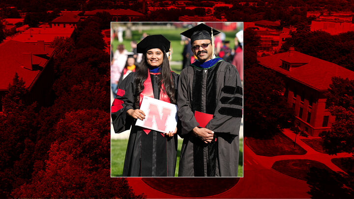 Heena Puri pictured with Dr. Louis and her Ph.D. diploma at the May 2023 Graduation Commencement.