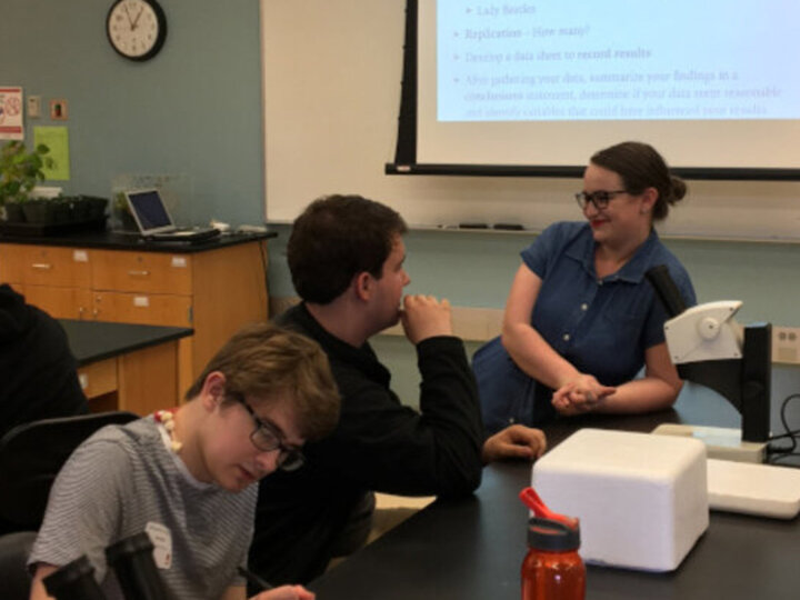 Kait Chapman Discusses with high school student at Visits with a Scientist Program at LPS