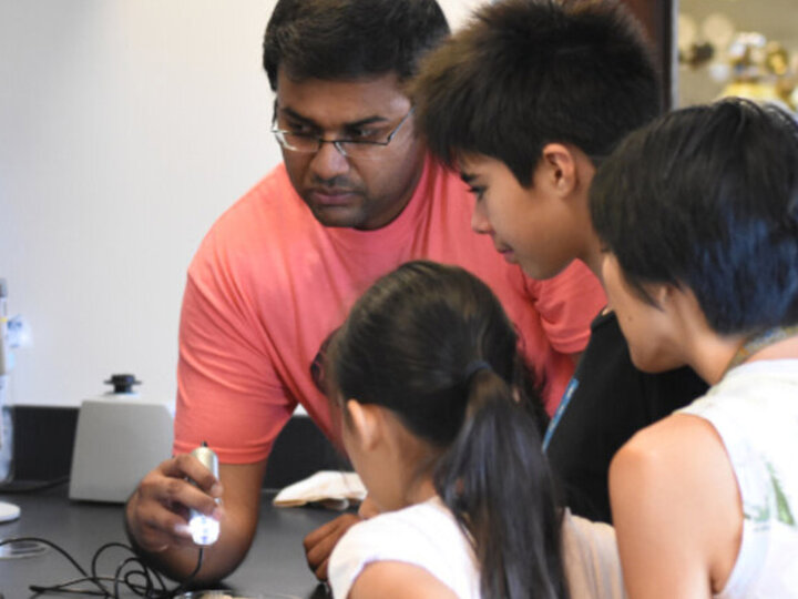 Suresh giving hands-on demonstration at BugFest